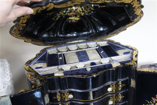 A Victorian papier mache combined jewellery and needlework casket, 17in. height 22in.